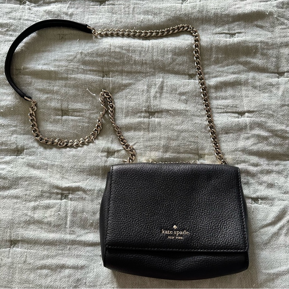 Kate Spade. Black Leather Crossbody Bag with Silver toned Chain Strap
